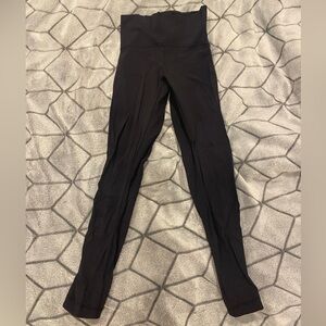 Black lululemon leggings with rose mesh details